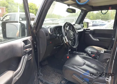 2015 Jeep Wrangler Unlimited Sahara from USA, damaged, VIN 1C4HJWEG3FL661568